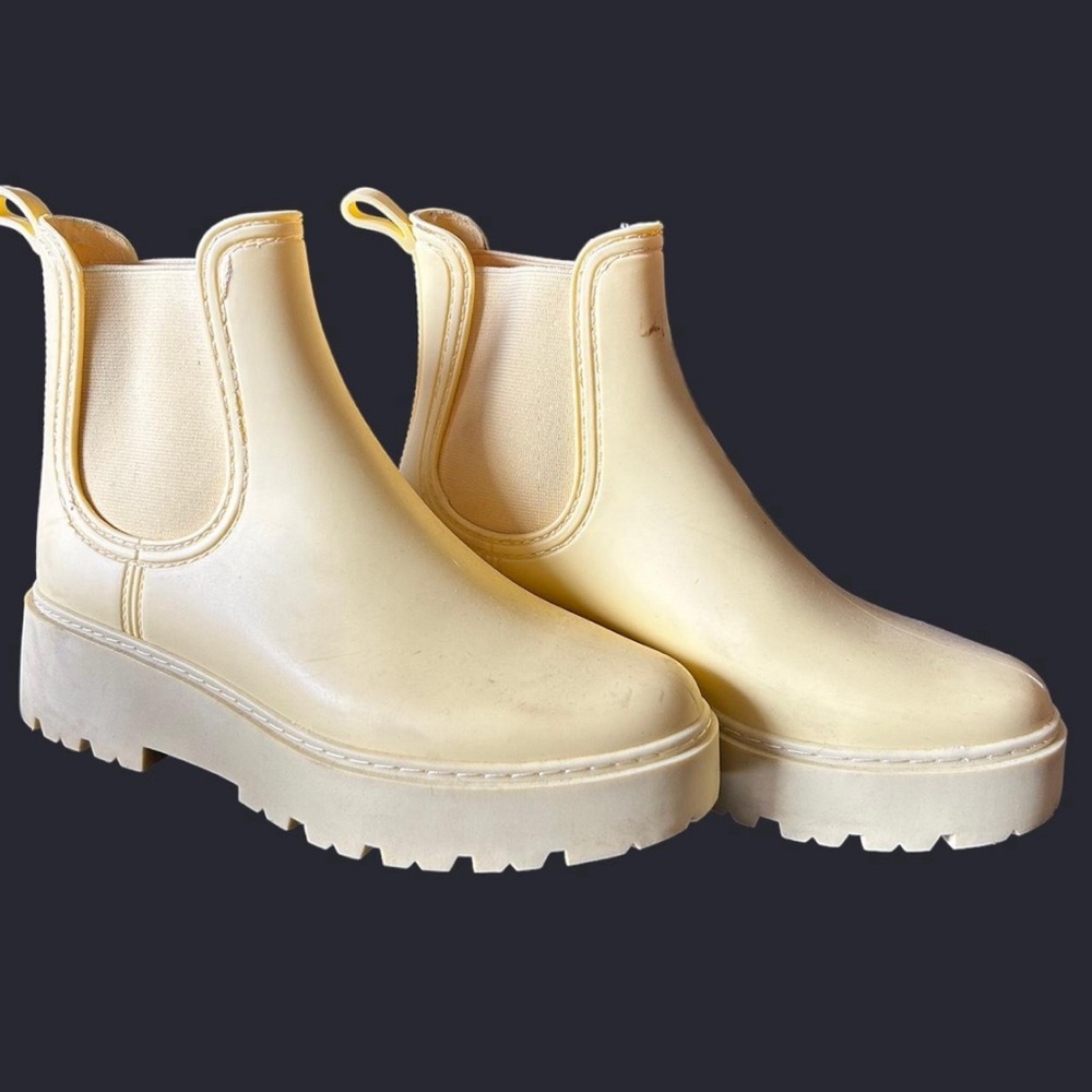Lightly worn yellow Dolce Vita Rain Boots